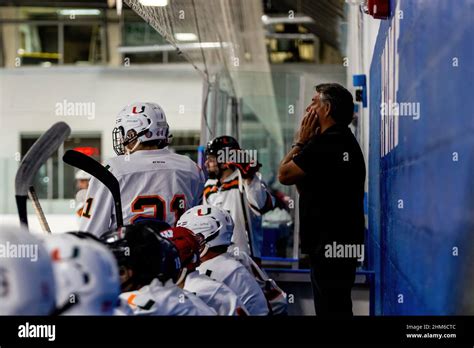 Miami Ice Hockey Team, Coach during hockey match between FAU Owls and Miami Hurricanes at ...