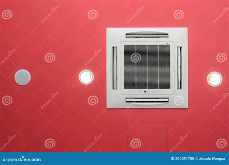 Ceiling Air Conditioner On Red Ceiling Light And Loudspeaker Stock