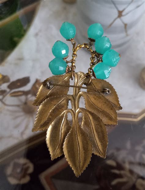 Old glass grape brooch | Collectors Weekly