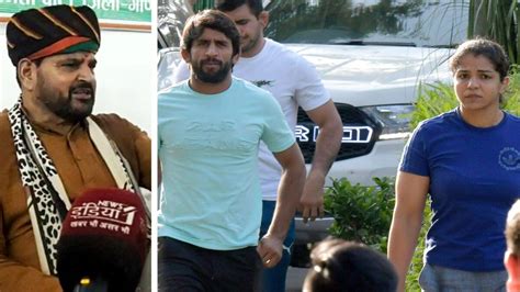 Bajrang Punia Sakshi Malik Blame Brij Bhushan Sharan Singh For Wfi