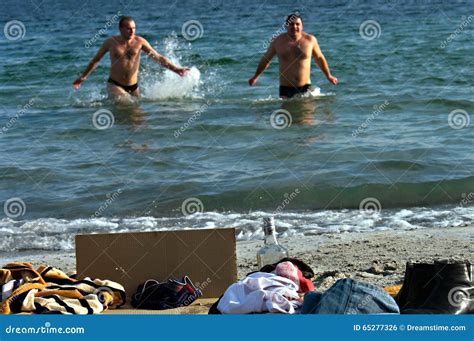 Peopls Swimming In Ice Cold Water Black Sea During Epiphany Holy