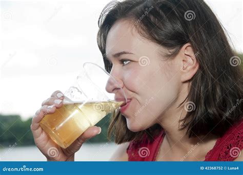 Pretty woman drinking beer stock photo. Image of drinking - 42368752