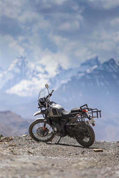 Royal Enfield Himalayan Motorcycle Against The Background Of Mountains