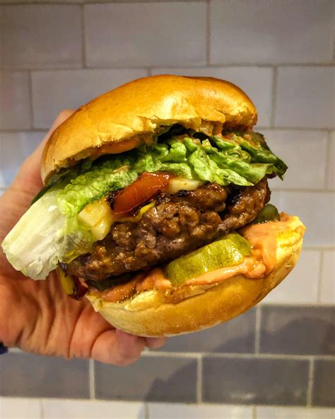 Homemade Simple Cheeseburger With Added Burger Sauce Lettuce Tomato