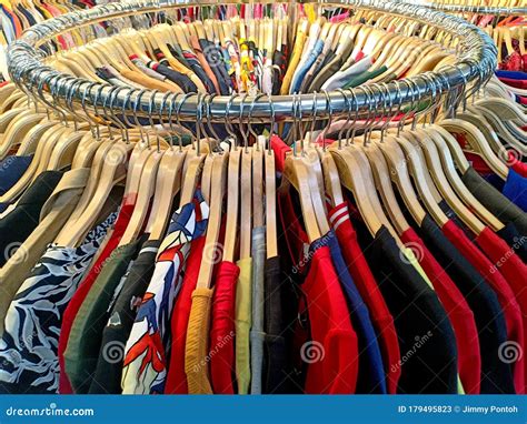 Colorful Apparel Hang on a Circle Iron Rail in a Clothing Store for Display Stock Image - Image ...