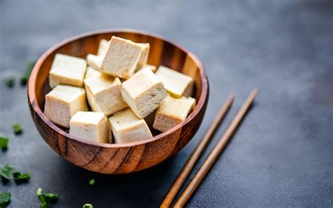 Premium Photo White Tofu On Wood Bowl