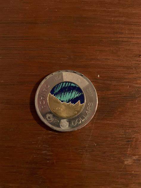 Canadian 2 dollar coin (toonie as we call it) I found with the northern lights picture. : r ...