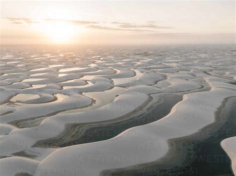 Aerial View Of Empty Sand Dunes And Lagoons At Lencois Maranhenses