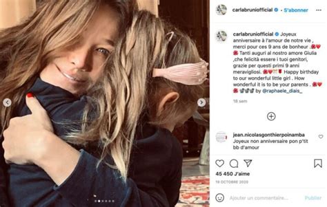 Carla Bruni D Voile Le Visage De Sa Fille Giulia Qui Fait Une Adorable