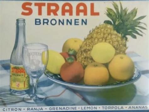 There Is A Sign That Says Straal Bronnen With Fruit On It