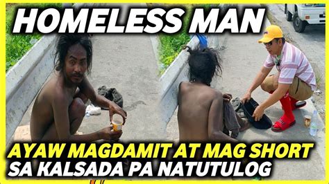 HOMELESS MAN NA WALANG DAMIT AT PANTALON NAKAHIGA SA TABI NG KALSADA