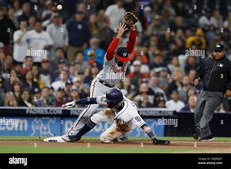 San Diego Padres Fernando Tatis Jr Below Slides In Safely To Third