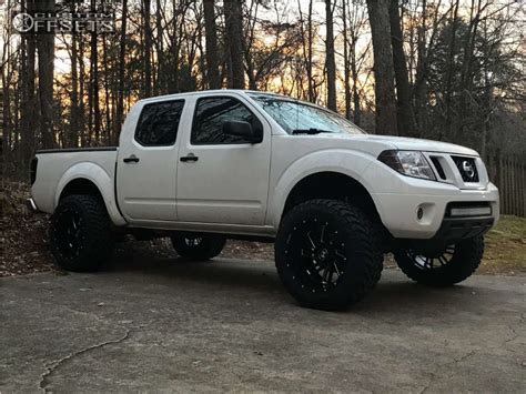 2014 Nissan Frontier With 20x12 44 Hostile Stryker And 33125r20 Nitto Trail Grappler And