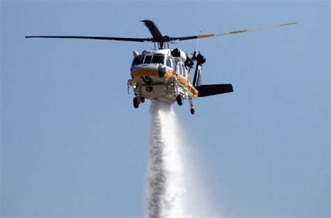 County takes possession of two new firefighting helicopters