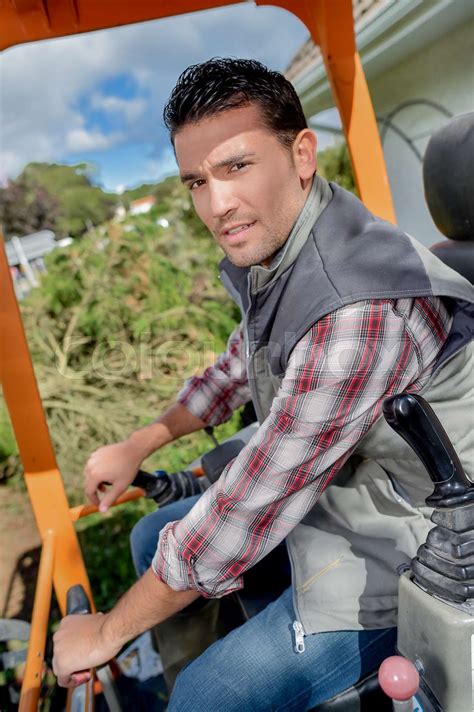 Man Operating A Digger Stock Image Colourbox