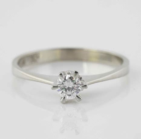 ENSTENSRING 18K Vitguld Med Briljantslipad Diamant 0 24 Ct