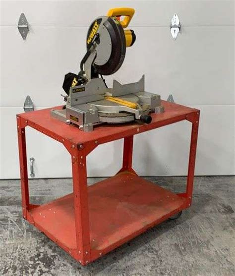 Dewalt Dw Compound Miter Saw On Cart Schneider Auctioneers Llc