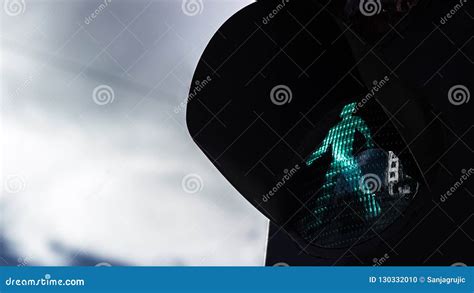 Green Pedestrian Light on Dramatic Sky Stock Photo - Image of morning ...