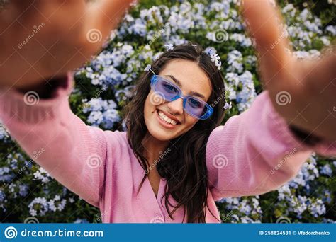 Close Up Young Caucasian Girl Smiling Teeth Looking At Camera On