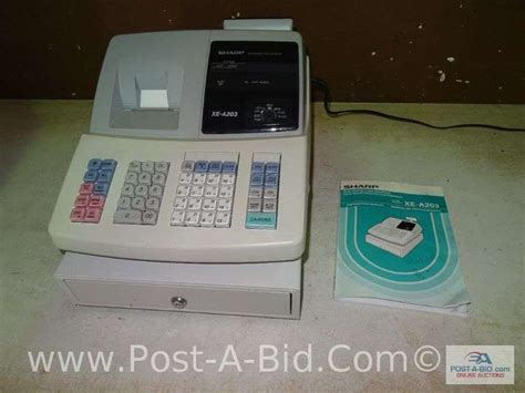 sharp xe  electronic cash elsenpeter auctions real estate