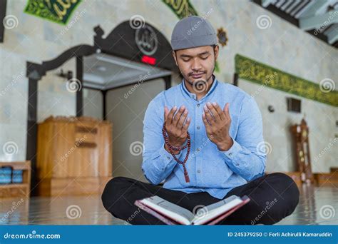 Muslim Man Doing Sujud Or Sajdah On The Glass Floor Royalty Free Stock