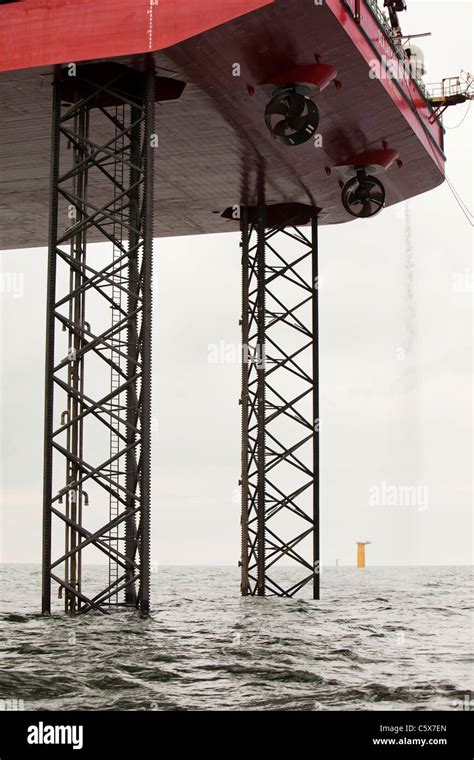 A Jack Up Barge Fitting Wind Turbines In The Walney Offshore Windfarm Project Off Barrow In