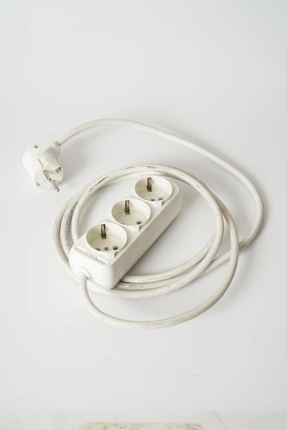 Premium Photo White Electrical Socket On A White Surface