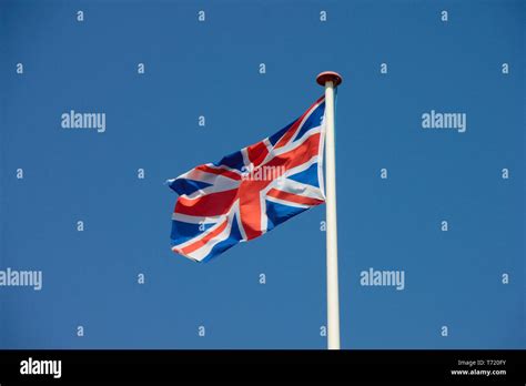 Union Jack Flag Flapping In The Wind Hi Res Stock Photography And