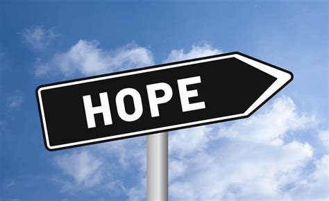 Premium Photo Hope Road Sign On Cloudy Sky Background