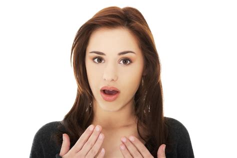 Premium Photo Portrait Of Shocked Woman Against White Background