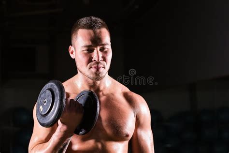 Muscular Man Working Out In Gym Doing Exercises With Dumbbells At Biceps Strong Male Naked