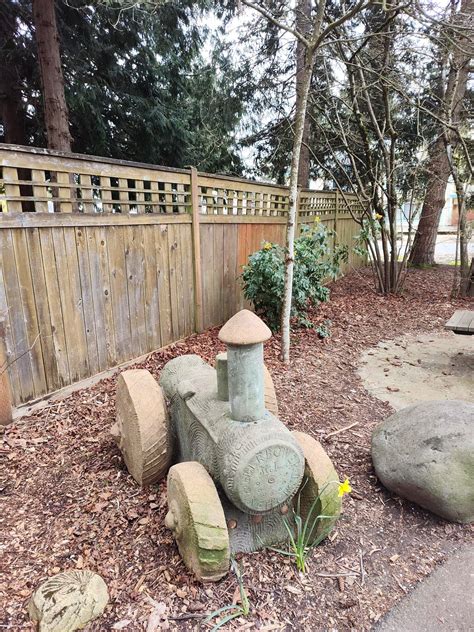 Pinehurst Pocket Park tractor art.vertical photo | Wedgwood in Seattle