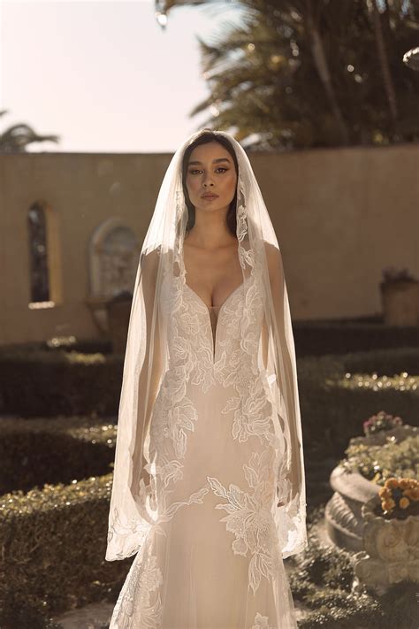 The BLAIR Gown In Ivory Mocha By Madi Lane Bridal Style Number