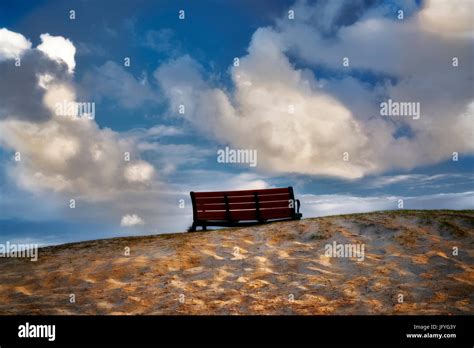 Bench with sunrise clouds. Kailua Beach Park, Oahu, Hawaii Stock Photo ...