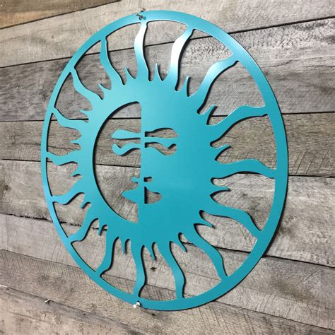 A Metal Sun On A Wooden Wall