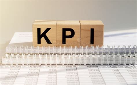 Kpi Key Performance Indicator Text On Wooden Cubes On Office Table For