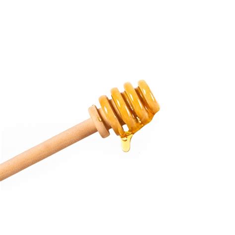 Premium Photo Honey Dripping From Dipper Wooden Honey Stick Isolated