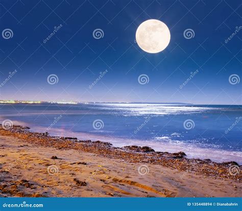 Full Moon Shining Bright Above The Sea In Larnaca Stock Photo Image