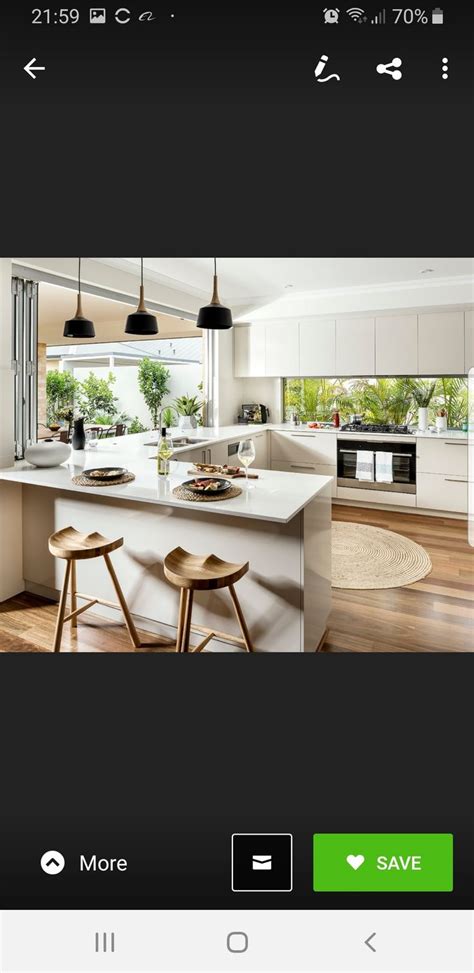 U shaped kitchen with window splashback | Window seat kitchen, Kitchen ...