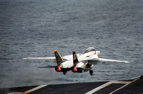 A Fighter Squadron Vf F A Tomcat Aircraft Takes To The Air