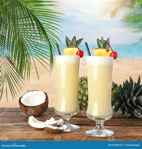 Tasty Pina Colada Cocktail On Wooden Table Near Ocean Stock Image Image Of Glass Cool 237296127