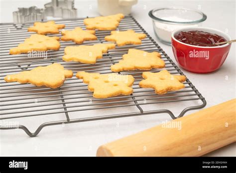 Classic Shortbread Cookies With Raspberry Preserves Recipe Cookies Close Up On Cooling Rack