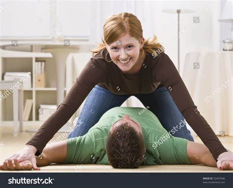 Playful Young Woman Pinning Man Floor Stock Photo 32497096 - Shutterstock