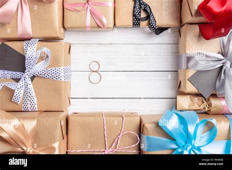 Frame Of Gift Boxes With Ribbon And Bows On White Background Copy