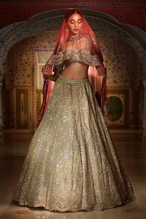 Buy Green Net Embroidered Sequin Sweetheart Neck Metallic Lehenga Set