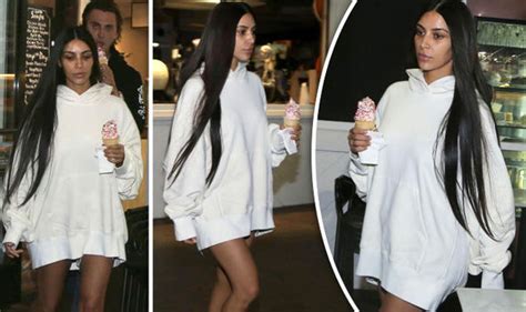 Kim Kardashian Looks Glum As She Surfaces In Thigh Skimming Hoodie