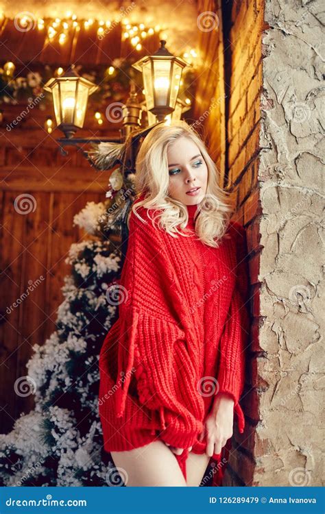 Christmas Fashion Woman Blonde In The Red Sweater Having Fun And