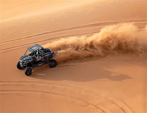 Experience The Thrill Of The Big Red Sand Dunes On A Buggy In Dubai