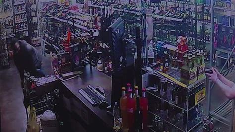 Surveillance Video Shows Liquor Store Owner Daughter Shoot Armed Would