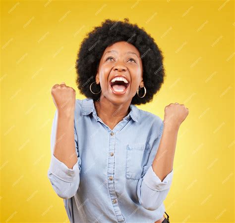 Premium Photo Black Woman Excited Face And Celebrate Win In Studio